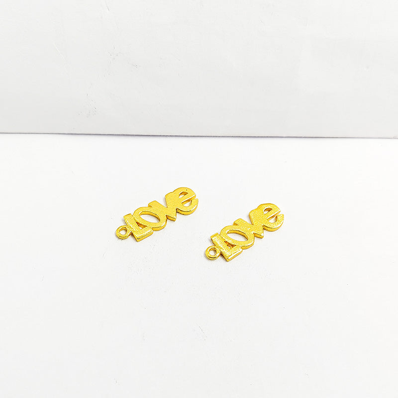 LOVE word pendant in 18K Gold Overlay Over Copper handcrafted in India with textured gold finish for retail jewelry customers