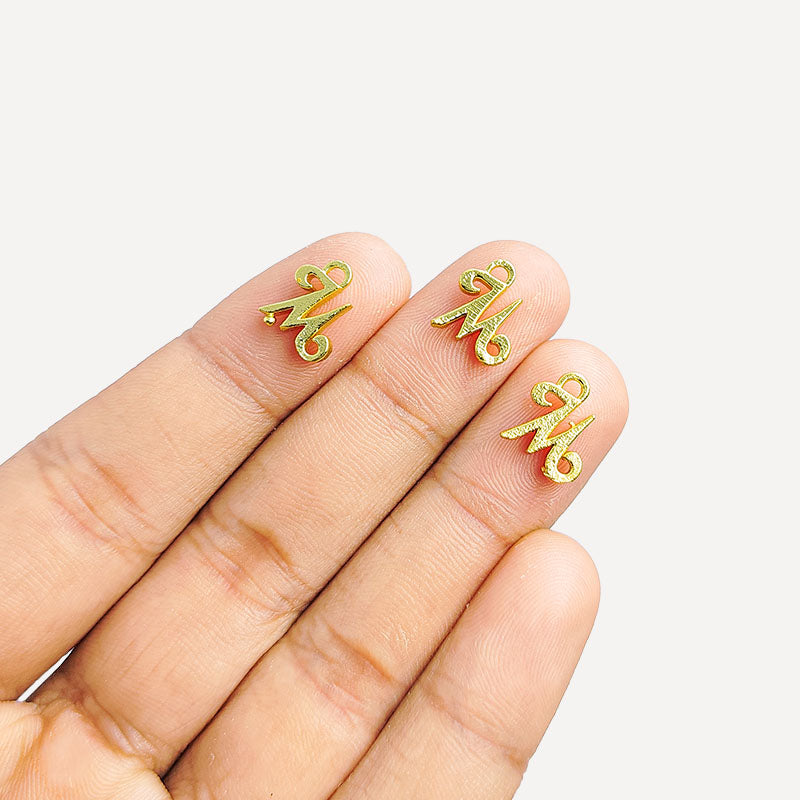 Alphabet M Charm  handcrafted in India with elegant textured gold-tone finish for everyday wear.