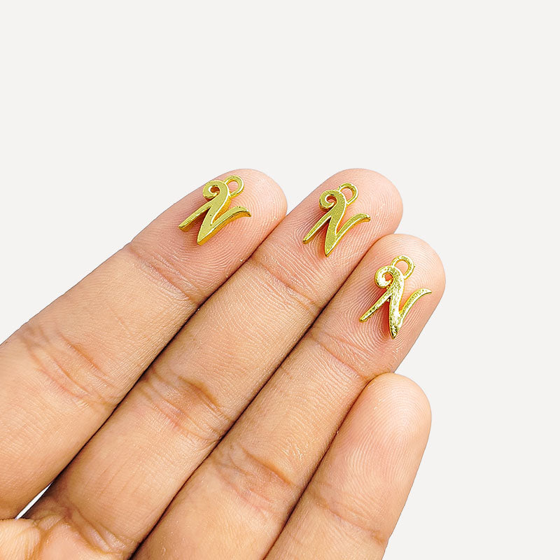 ‘N’ charm handcrafted in India with elegant textured gold-tone finish for everyday jewelry use.