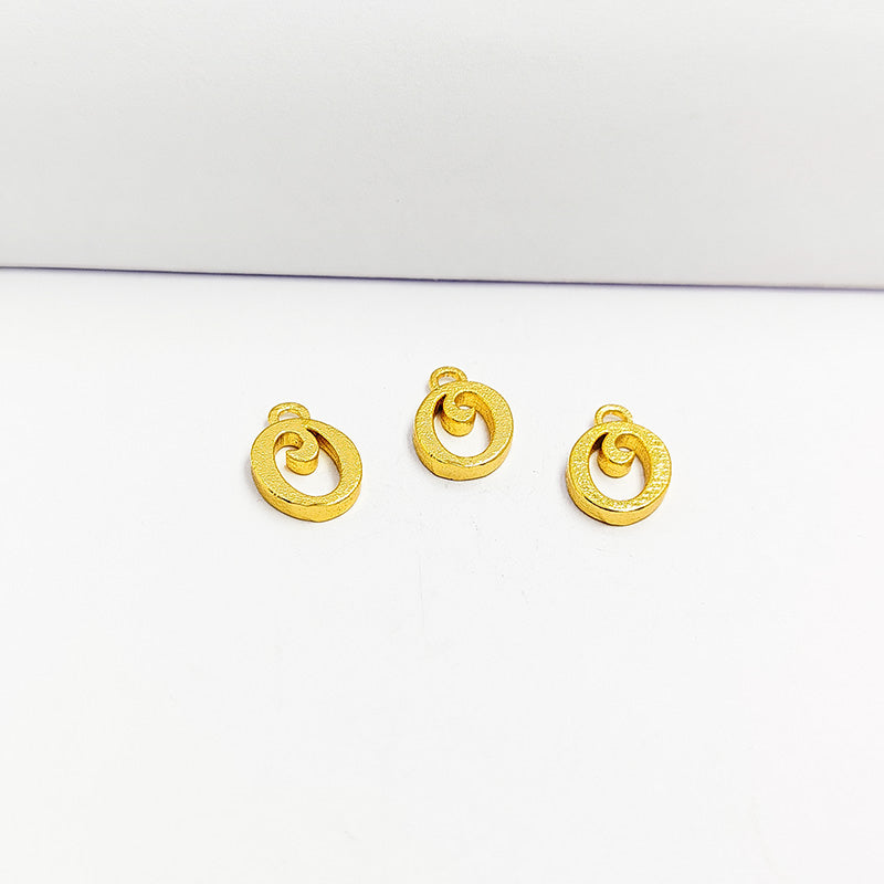 ‘O’ charm handcrafted in India featuring 18K Gold Overlay Over Copper with elegant textured finish.
