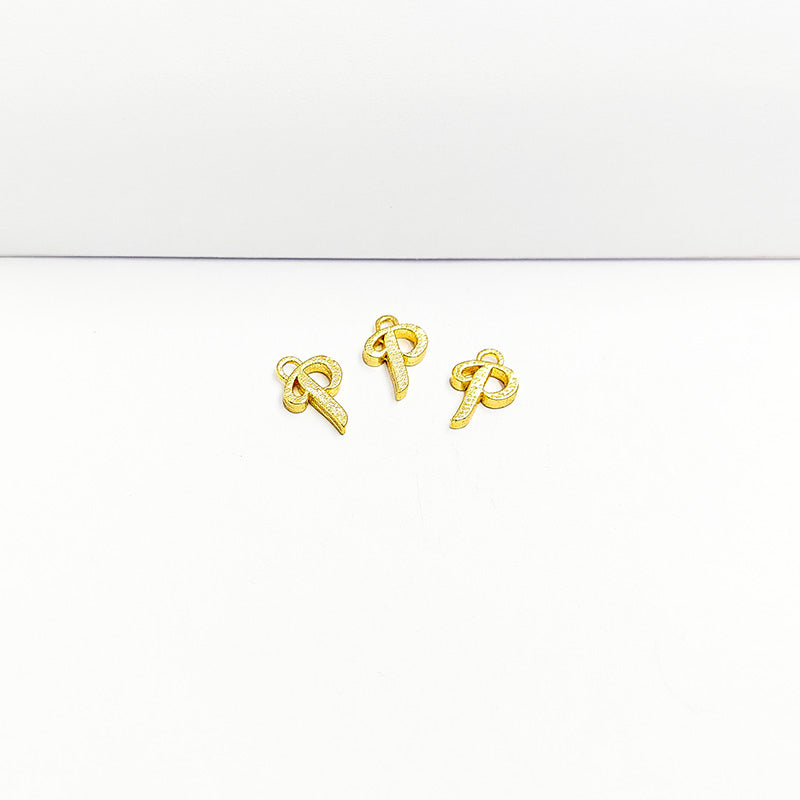 ‘P’ charm handcrafted in India featuring 18K Gold Overlay Over Copper with elegant textured finish.
