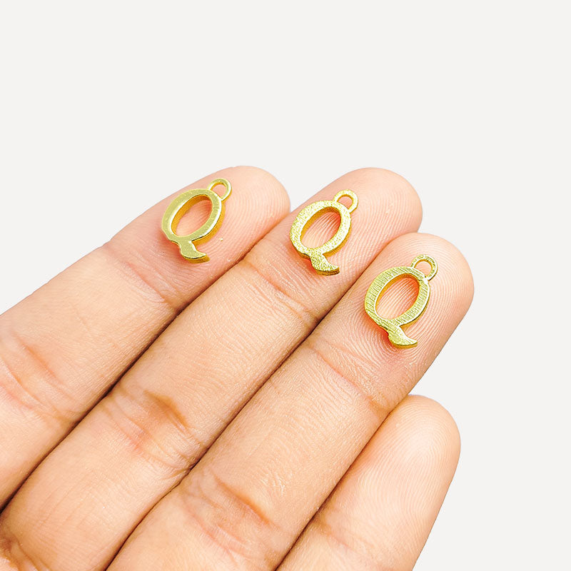 ‘Q’ charm handcrafted in India featuring 18K Gold Overlay Over Copper with elegant textured finish.