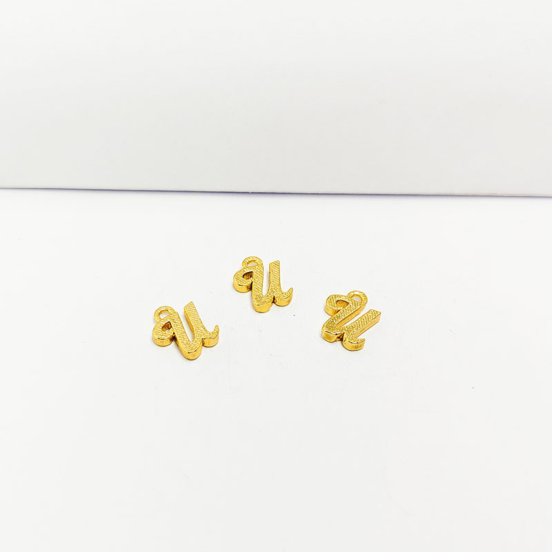 ‘U’ charm handcrafted in India featuring 18K Gold Overlay Over Copper with elegant textured finish.