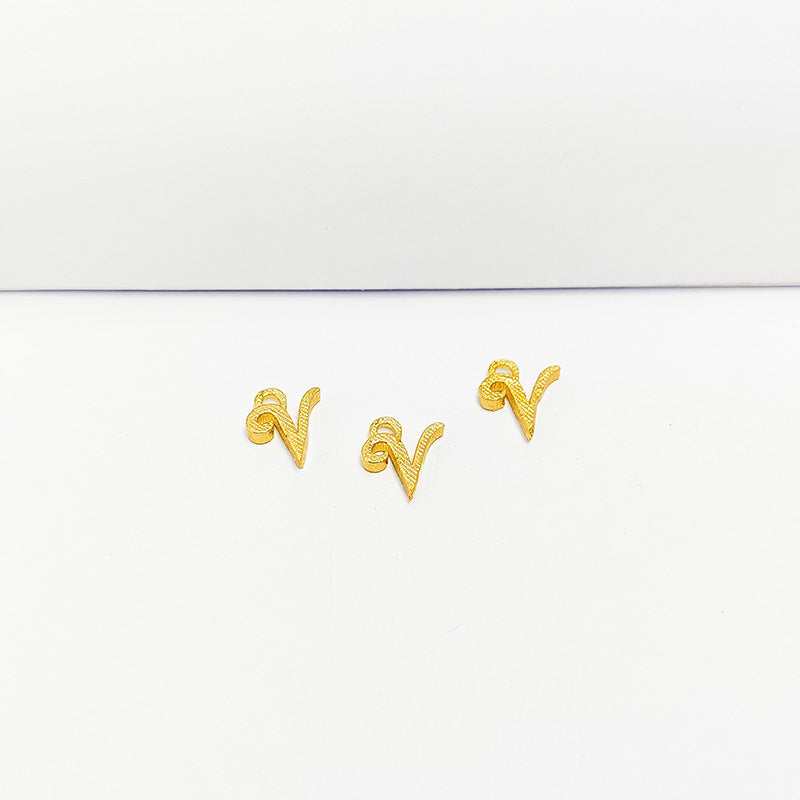 ‘V’ charm handcrafted in India featuring 18K Gold Overlay Over Copper with elegant textured finish.