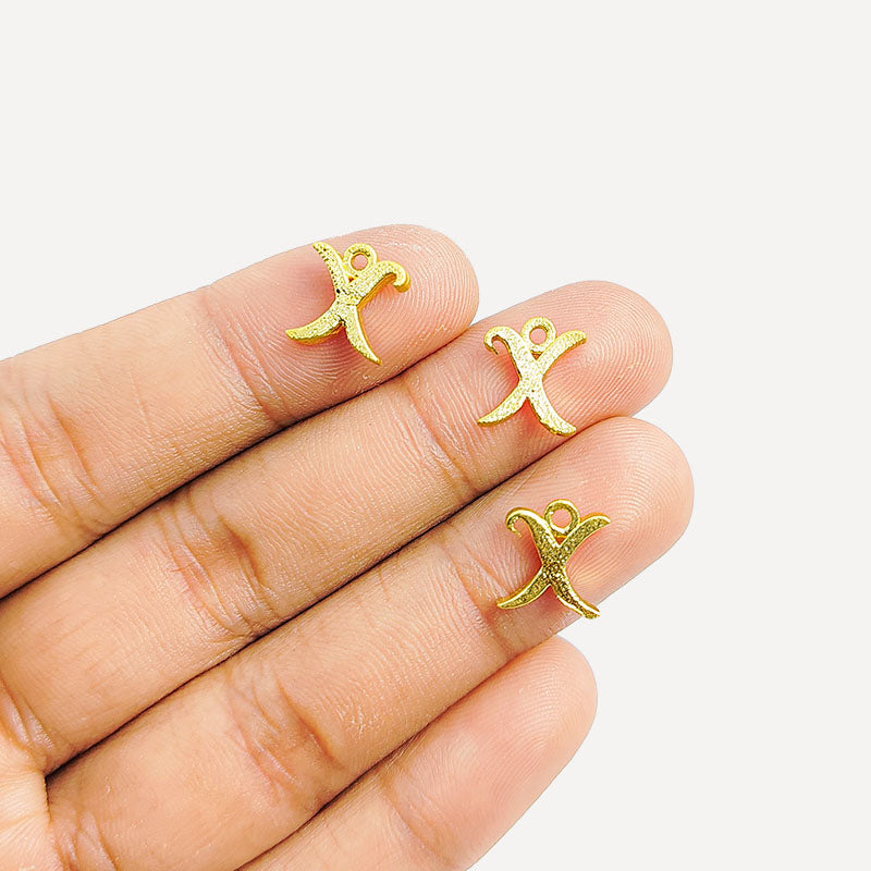 ‘X’ charm handcrafted in India featuring 18K Gold Overlay Over Copper with elegant textured finish.