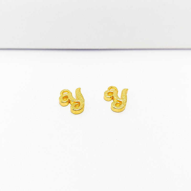 ‘Y’ charm handcrafted in India featuring 18K Gold Overlay Over Copper with elegant textured finish.