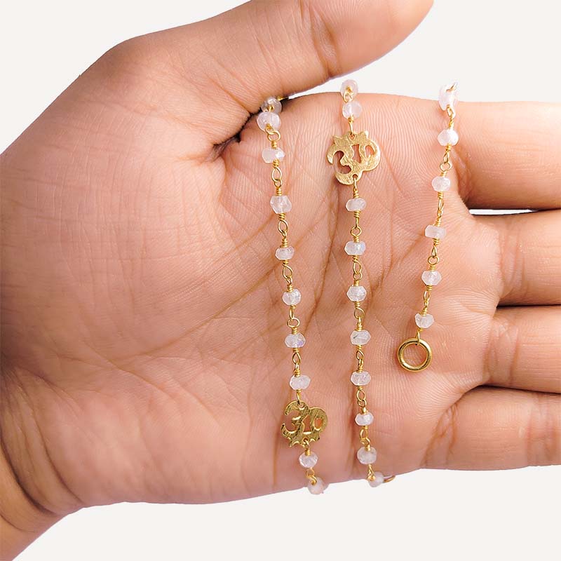 Elegant rainbow moonstone beaded necklace with Om motif accent and smooth 18K Gold Overlay Over Copper designed for everyday and festive wear