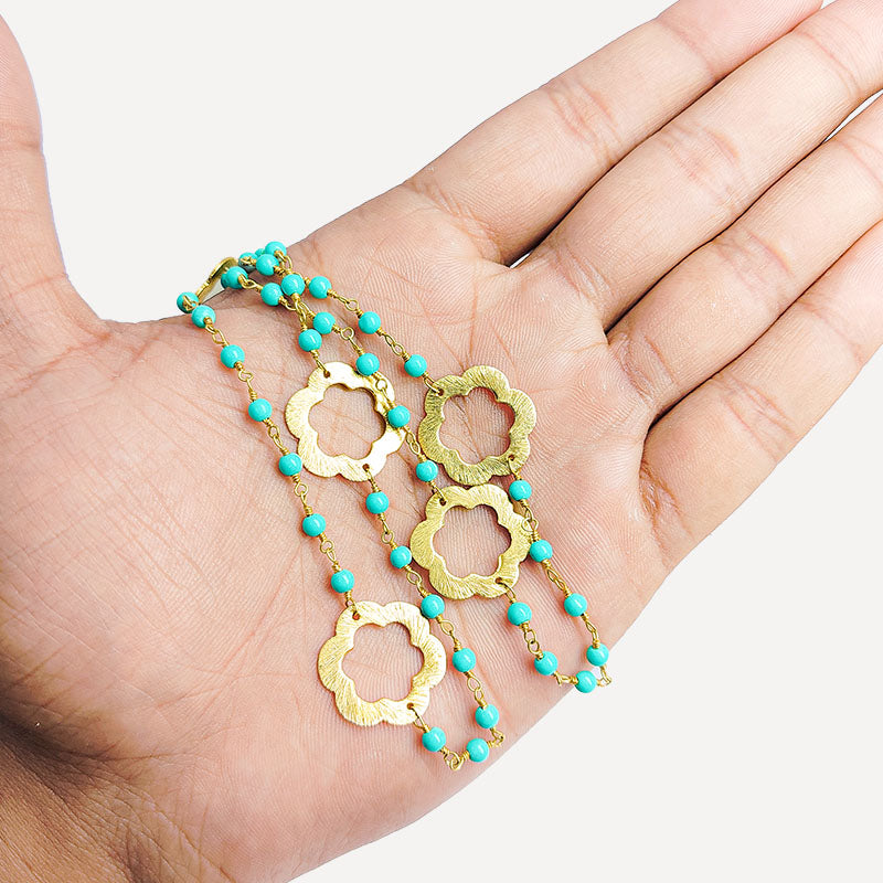 Elegant turquoise shell beaded necklace with floral motif accents and smooth 18K Gold Overlay Over Copper designed for everyday and festive wear