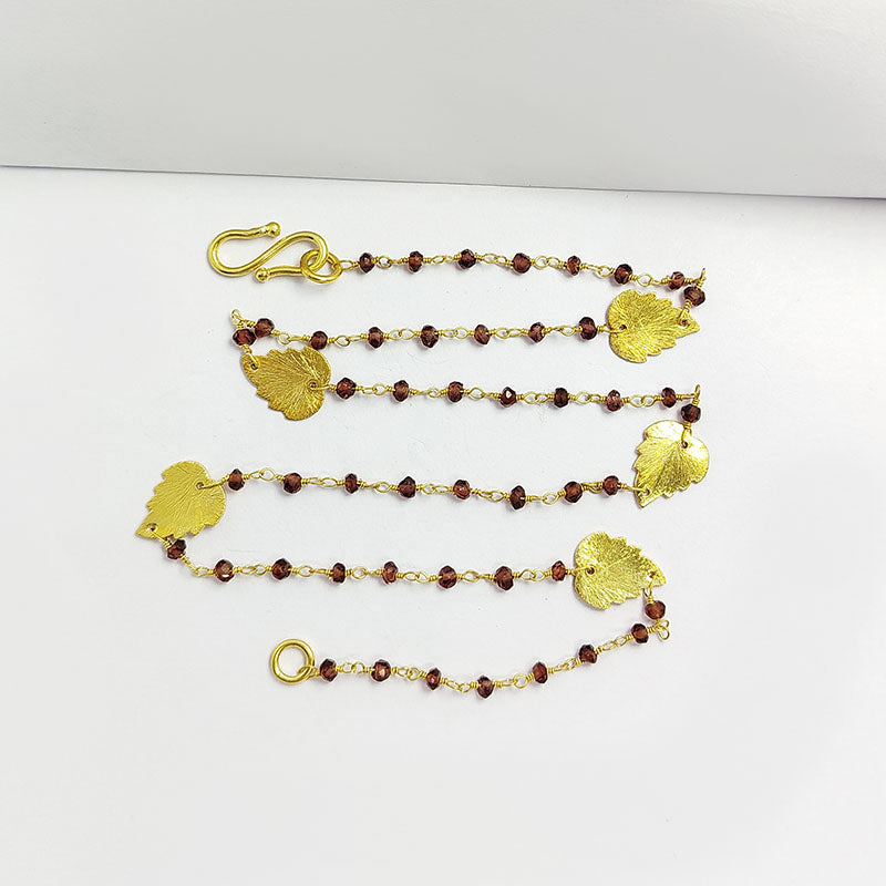 Elegant red garnet beaded necklace with leaf motif accents and smooth 18K Gold Overlay Over Copper designed for everyday and festive wear