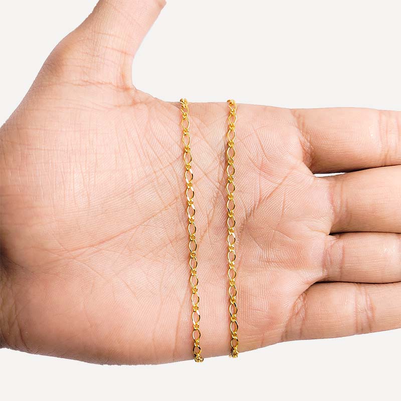 Alternating oval link jewelry chain crafted with 18K Gold Overlay Over Copper featuring mixed link sizes sold per foot for DIY jewelry projects