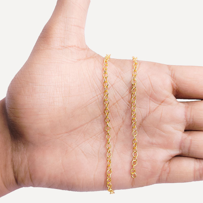 Textured oval link chain made with 18K Gold Overlay Over Copper featuring smooth polished 4MM links, twisted detailing, and flexible length sold per foot for custom jewelry projects