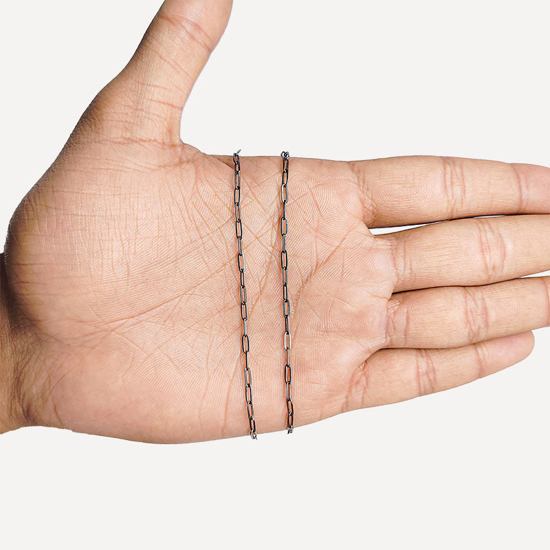 Slim elongated oval link chain crafted with Black Rhodium Overlay Over Copper, ideal for everyday jewelry styling, layering looks, and custom accessory designs