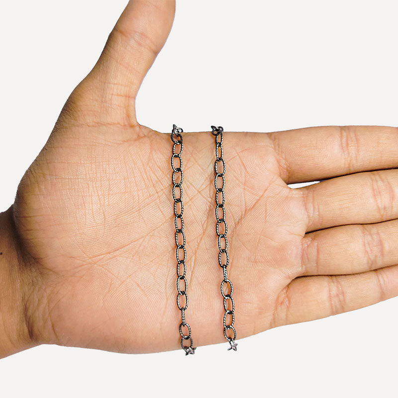 Large textured oval link chain crafted with Black Rhodium Overlay Over Copper, designed for bold jewelry styling, statement accessories, and creative custom design projects