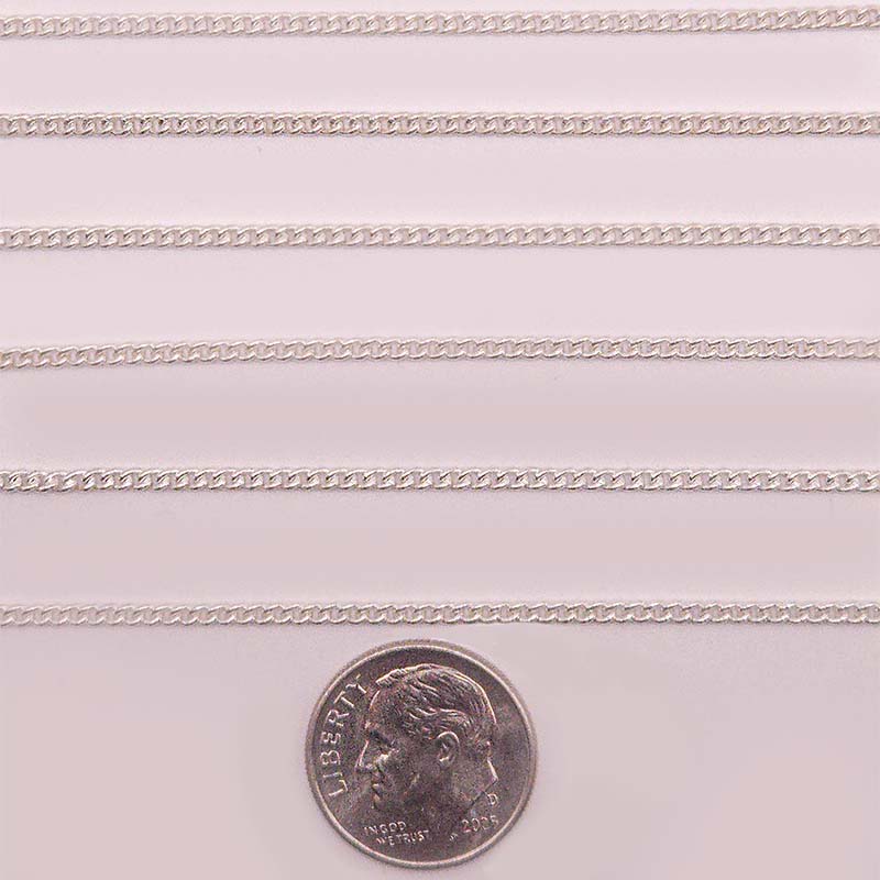 Silver overlay over copper beading and extender chain with polished curb links shown on white background for retail jewelry styling and customization