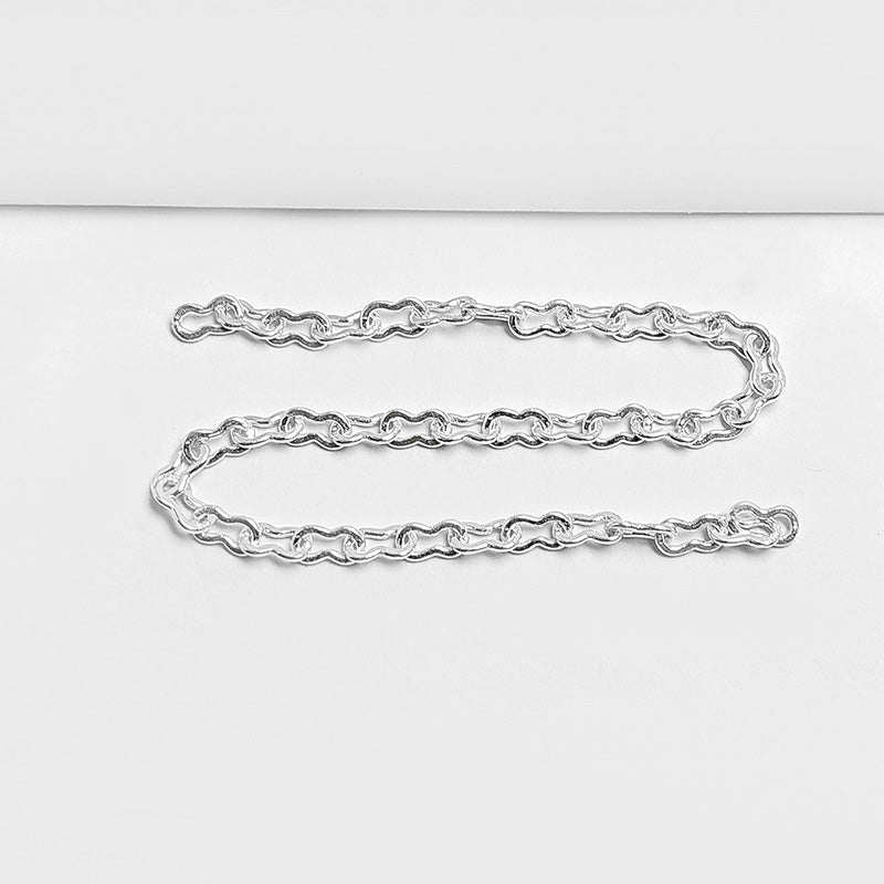 Elegant fine beading and extender chain made with silver overlay over copper featuring polished finish and smooth links for modern jewelry designs