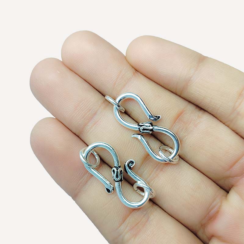 Silver overlay over copper curved hook handcrafted in India for retail jewelry making