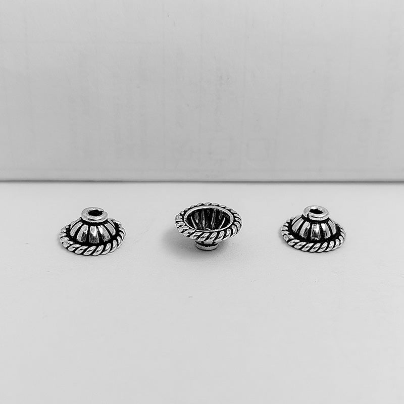Silver overlay over copper bead cap handcrafted in India for retail jewelry making
