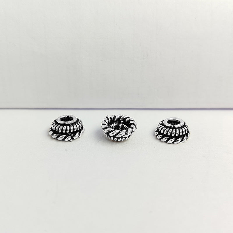 Silver overlay over copper rope-detail bead cap handcrafted in India for retail jewelry making