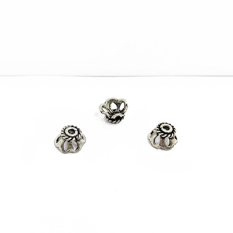 Silver overlay over copper floral bead cap for decorative handmade jewelry designs