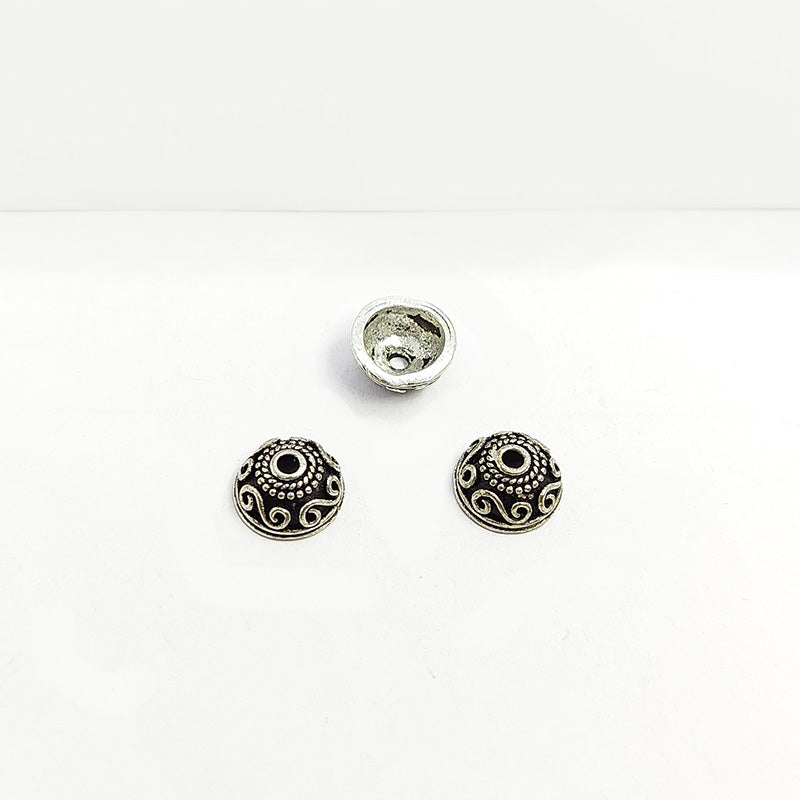 Silver overlay over copper scroll pattern bead cap for decorative handmade jewelry designs