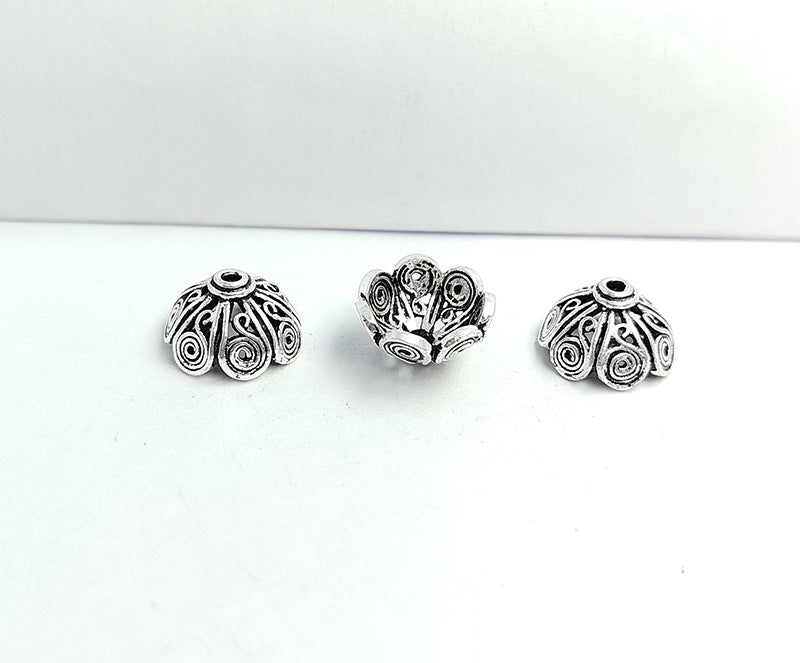 Silver overlay over copper bead cap from India handcrafted with swirl petal design and oxidized silver finish