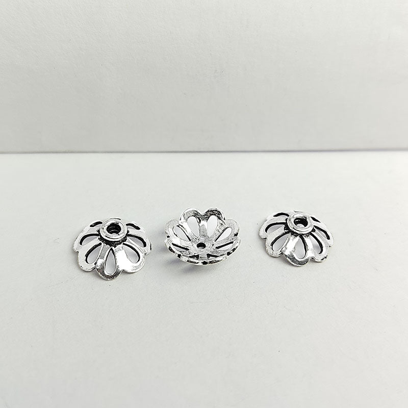 Elegant antique silver overlay over copper floral bead cap handcrafted in India for retail jewelry designs