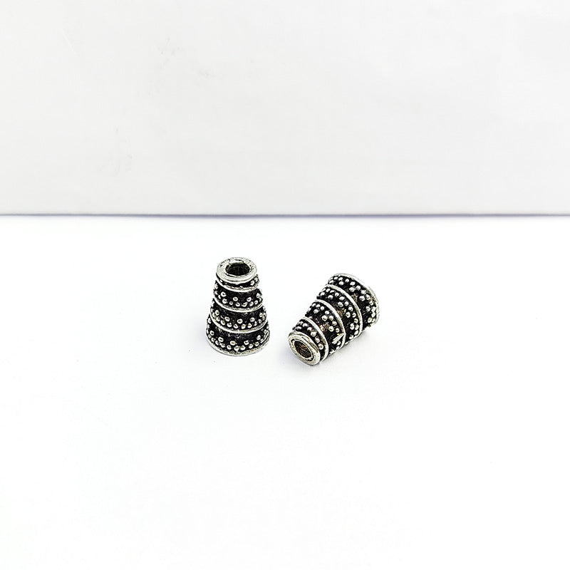 Elegant antique silver overlay over copper twisting granulation cone handcrafted in India for retail jewelry designs