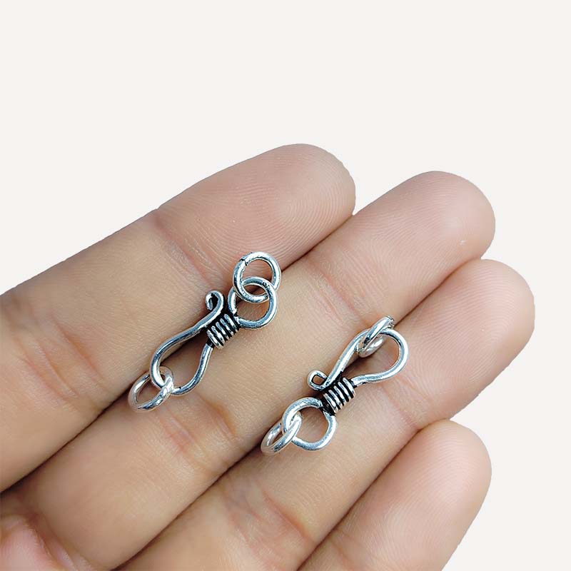 Elegant antique silver overlay over copper jewelry hook handcrafted in India for retail jewelry designs