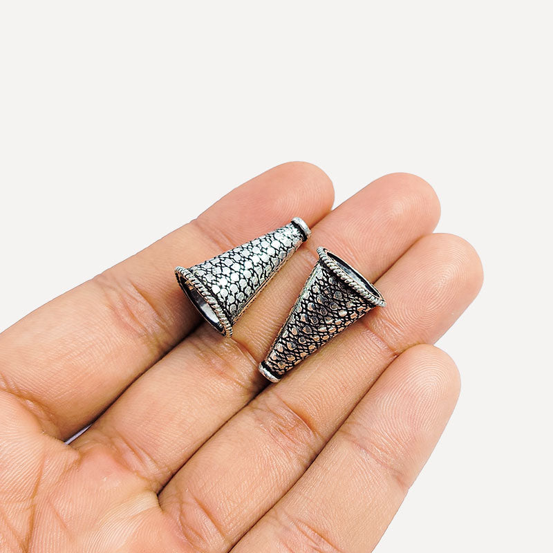 Elegant antique silver overlay over copper textured cone handcrafted in India for retail jewelry designs