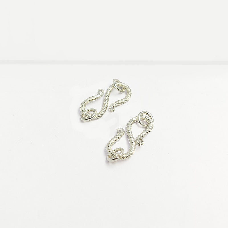 Silver Overlay Over Copper twisted S hook clasp handmade in India with antique oxidized finish.