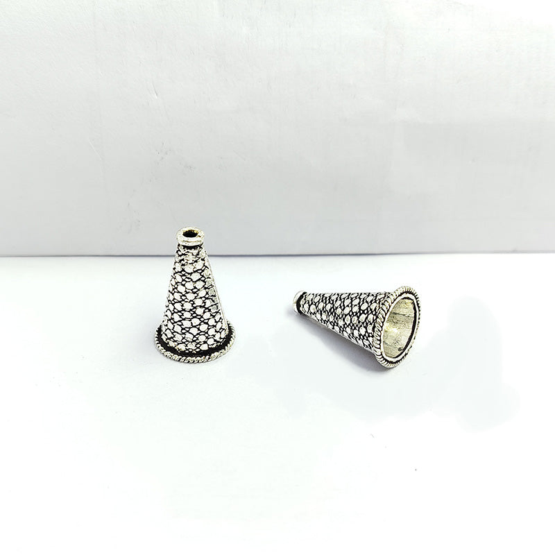 Elegant antique silver overlay over copper textured cone handcrafted in India for retail jewelry designs