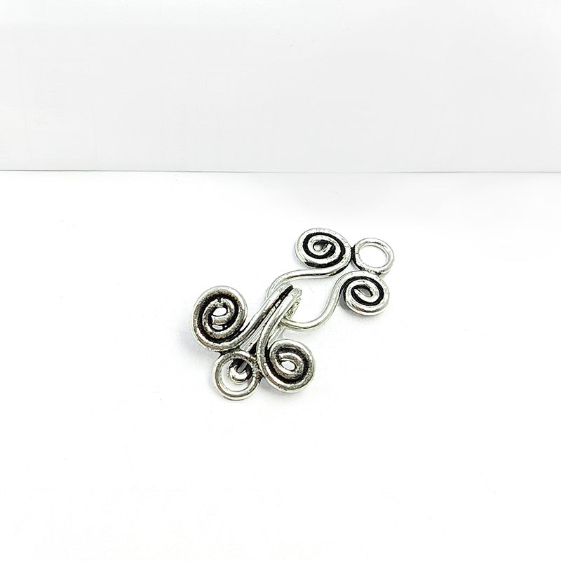 Silver Overlay Over Copper artisan spiral hook clasp handmade in India with antique oxidized finish.