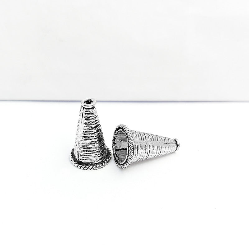 Silver Overlay Over Copper artisan spiral cone bead handmade in India with oxidized antique finish.