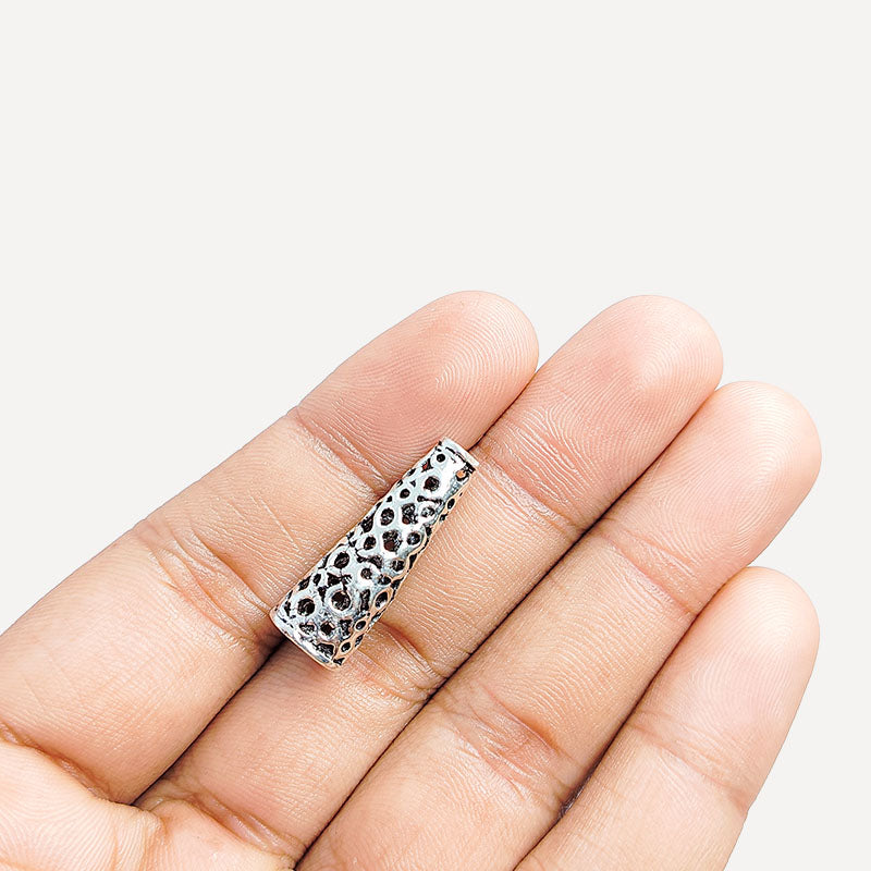 Silver Overlay Over Copper artisan cutwork cone bead handmade in India with antique oxidized finish.