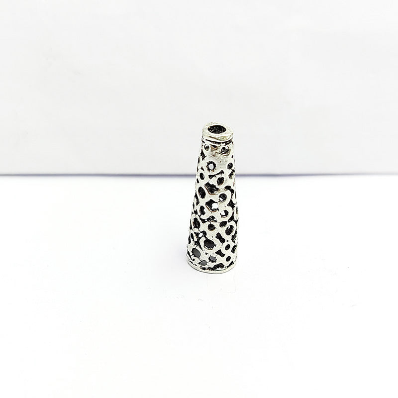 Silver Overlay Over Copper artisan cutwork cone bead handmade in India with antique oxidized finish.