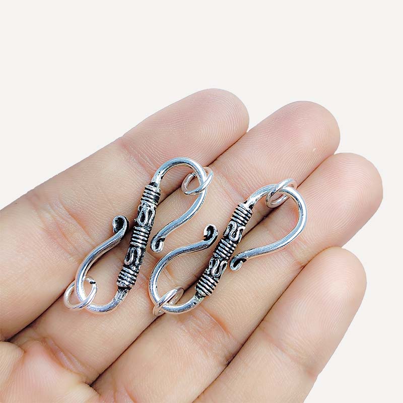 Silver Overlay Over Copper artisan barrel S hook clasp handmade in India with antique oxidized finish.