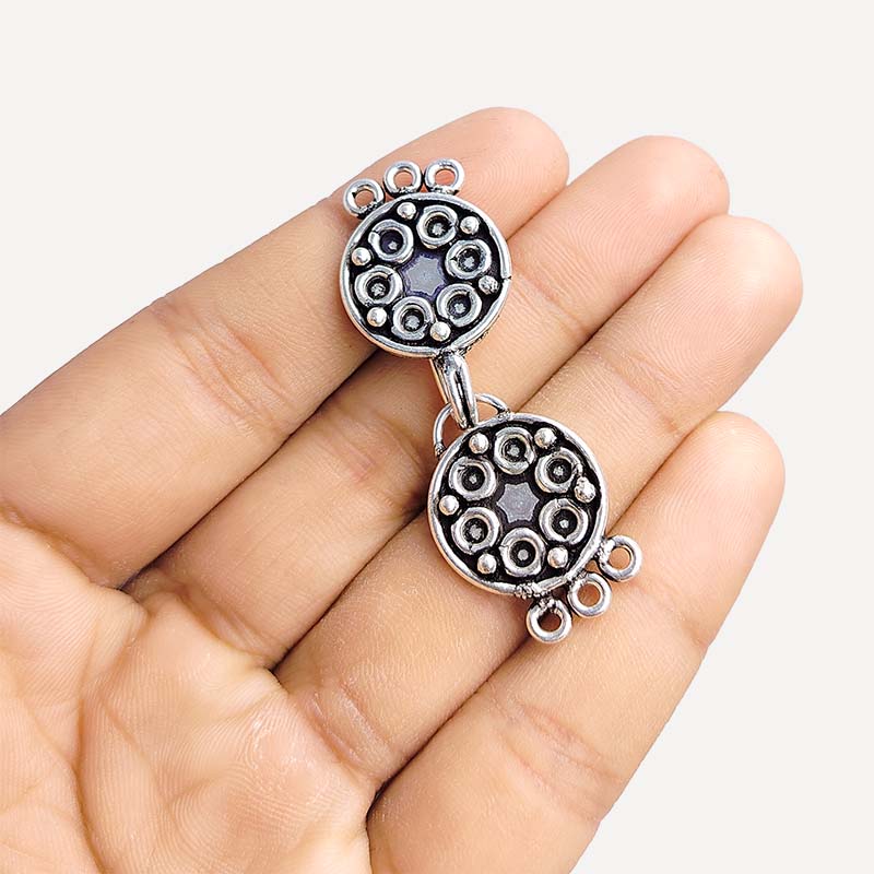 Silver Overlay over Copper round multi strand clasp with 3 holes handcrafted in India featuring star motif and antique finish.