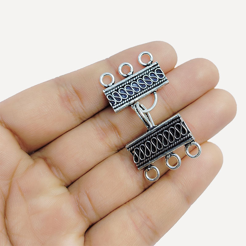 Silver Overlay over Copper rectangular multi strand clasp with 3 holes handcrafted in India featuring Bali wave detailing and antique finish.