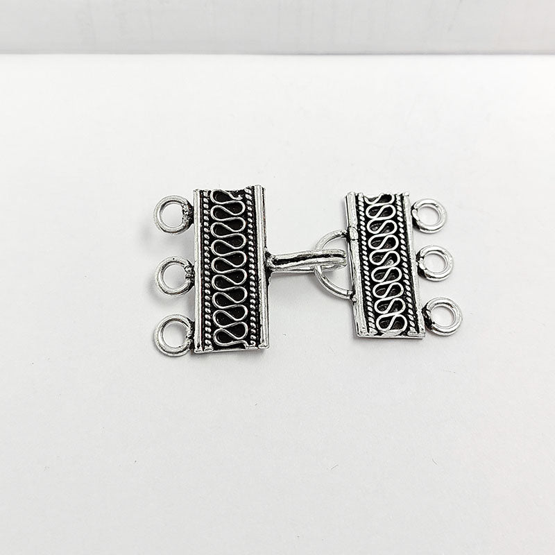 Silver Overlay over Copper rectangular multi strand clasp with 3 holes handcrafted in India featuring Bali wave detailing and antique finish.