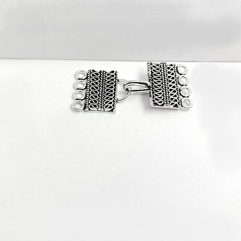 Silver Overlay over Copper rectangular multi strand clasp with 4 holes handcrafted in India featuring Bali wave detailing and antique finish.