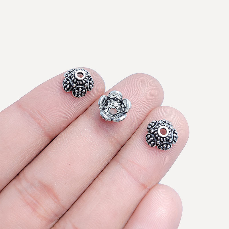 Elegant Silver Overlay Over Copper Bead Cap India 6MM x 9MM floral dome bead cap with 2MM inside hole and 7MM inside diameter