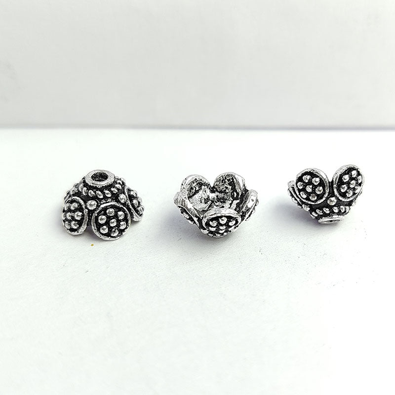 Elegant Silver Overlay Over Copper Bead Cap India 6MM x 9MM floral dome bead cap with 2MM inside hole and 7MM inside diameter