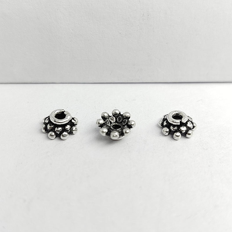 Silver Overlay Over Copper India dome bead cap with raised granule cluster pattern and antique oxidized finish.
