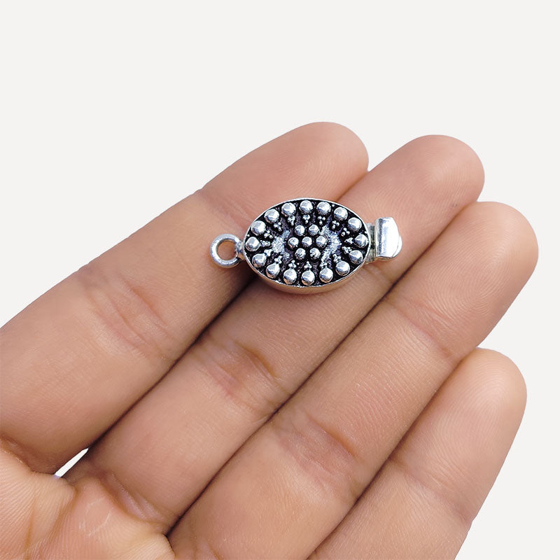 Silver Overlay Over Copper Oval Box Clasp handcrafted in India with dotted embossed design and antique finish for jewelry making.