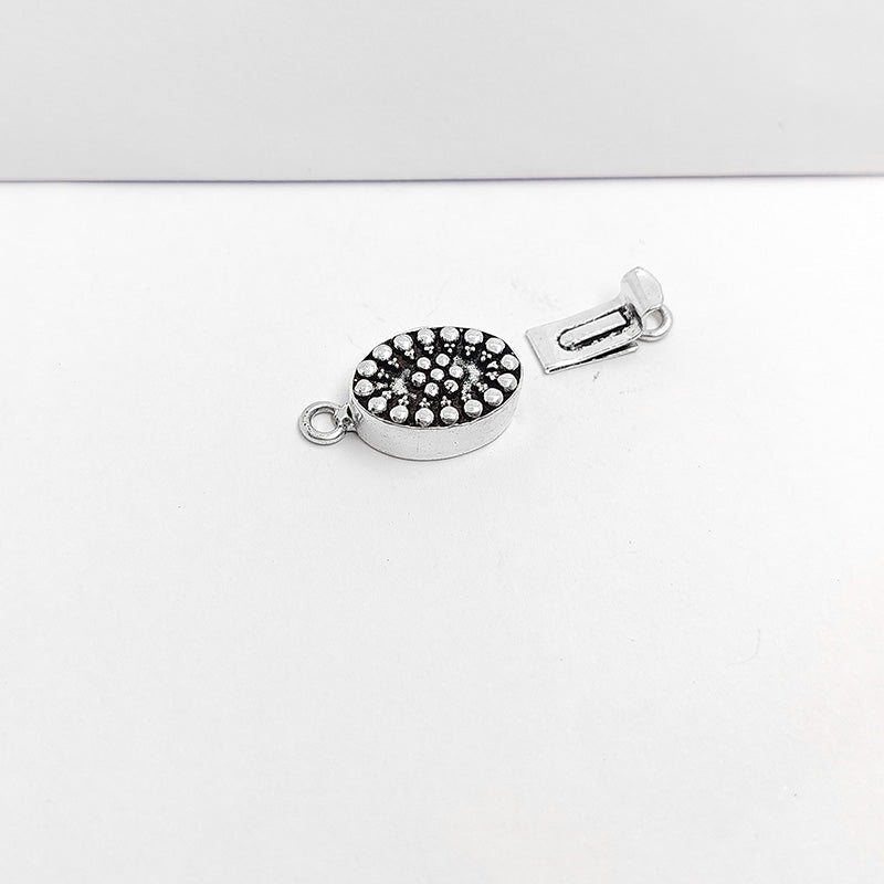 Silver Overlay Over Copper Oval Box Clasp handcrafted in India with dotted embossed design and antique finish for jewelry making.