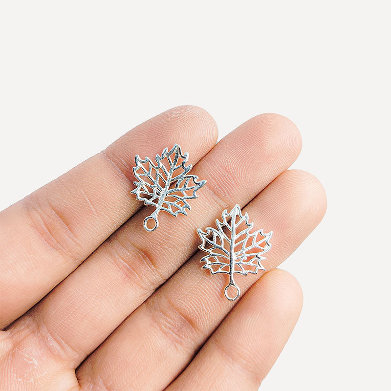 Silver Overlay Over Copper openwork leaf charm pendant handcrafted in India with antique finish for jewelry making.