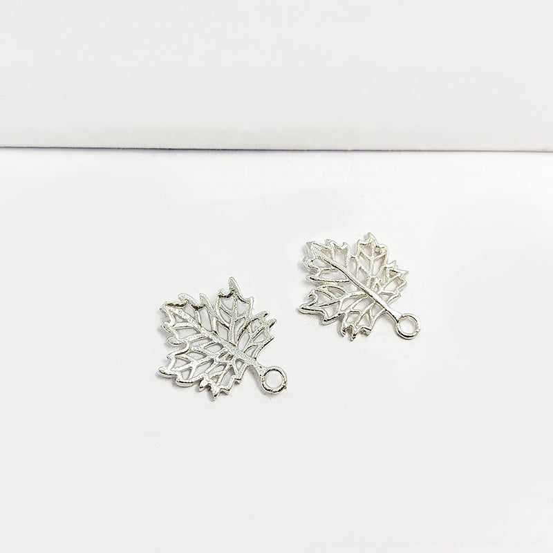 Silver Overlay Over Copper openwork leaf charm pendant handcrafted in India with antique finish for jewelry making.