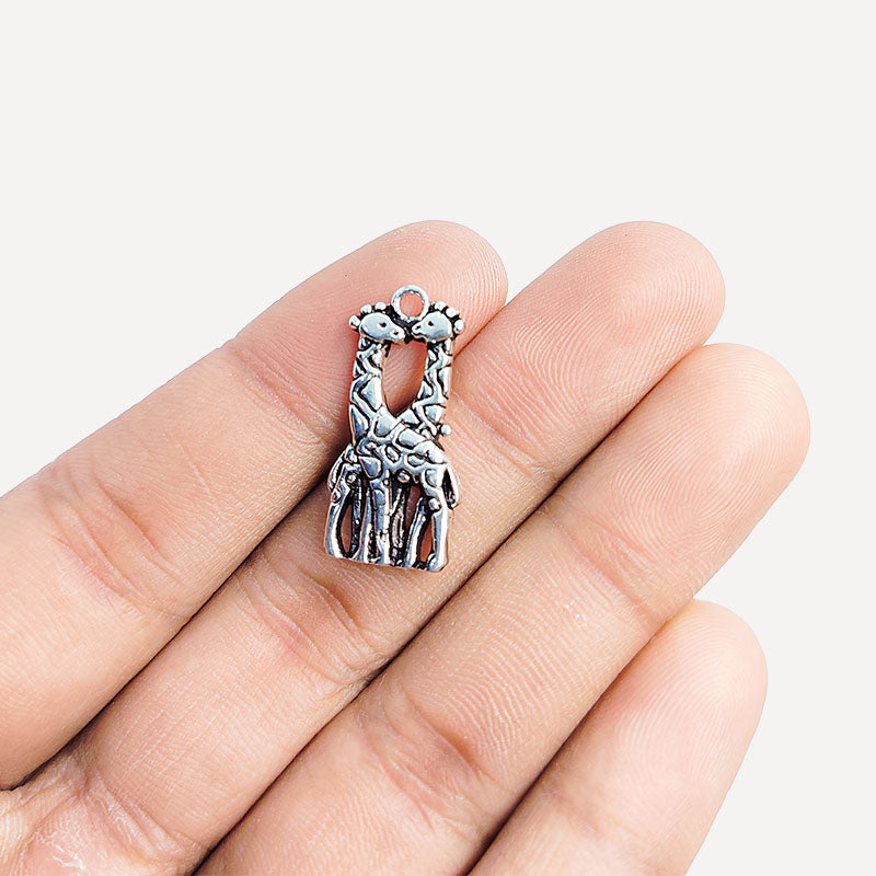 Silver Overlay Over Copper giraffe couple pendant handcrafted in India with antique oxidized finish.