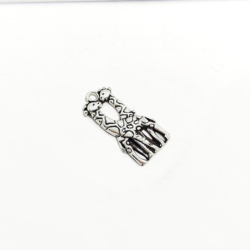 Silver Overlay Over Copper giraffe couple pendant handcrafted in India with antique oxidized finish.