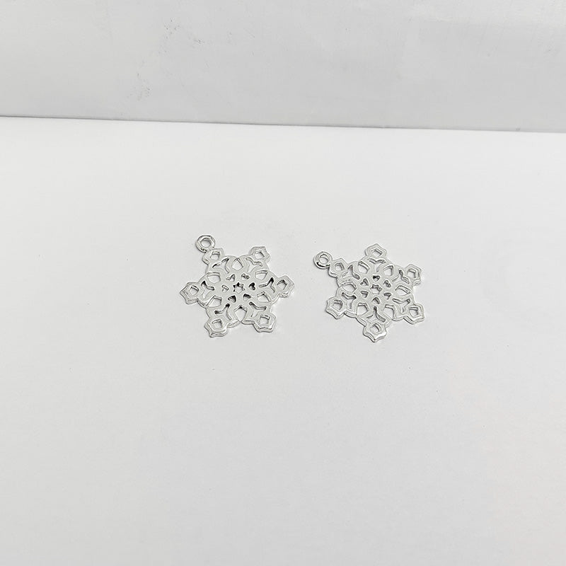 Silver Overlay Over Copper snowflake pendant handcrafted in India with antique oxidized finish.
